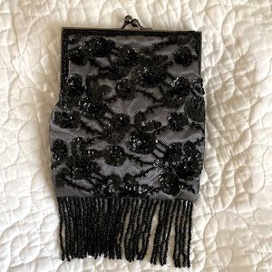 Lancôme lace/sequins clutch